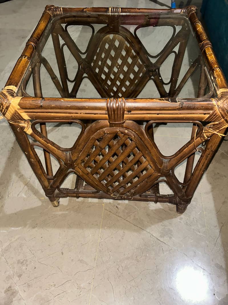 2 single-seater sofas-2 elegant side tables-1 Center Table 2
