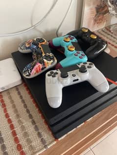 ps4 pro1 tb with 4 comtrollers 2 games