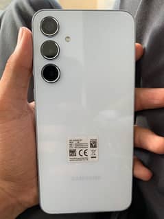 Samsung A55 5G brand new pta approved ha lakin sim not work urgent sel