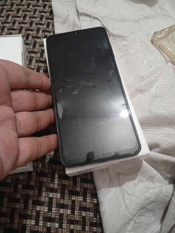 bulkul new mobile hai A06 abie sirf open Kay hai 6