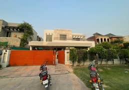 5KV Solar One Kanal Slightly Used Bungalow For Rent DHA Phase 4 Lahore