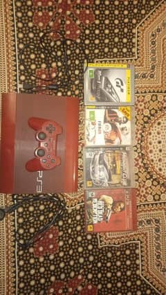 PS3 with games and controller