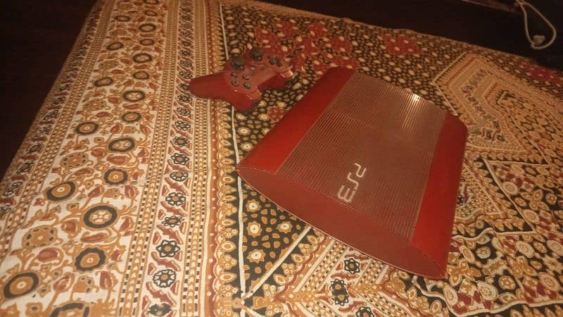 PS3 with games and controller 4