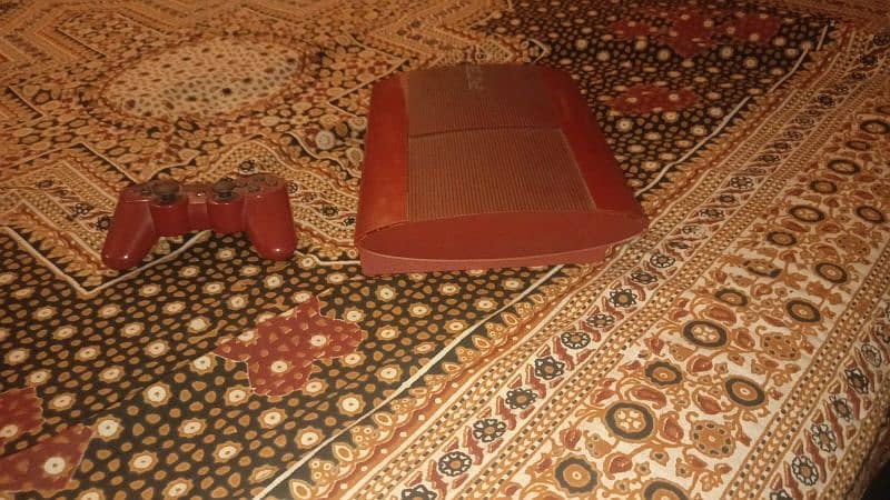 PS3 with games and controller 5