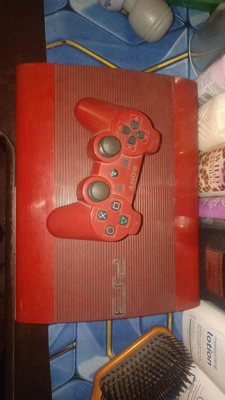 PS3 with games and controller 6