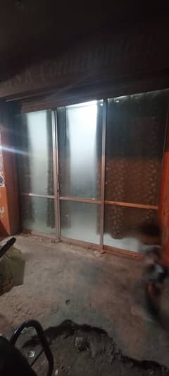 6' x 8' Aluminium Glass with center sliding door.