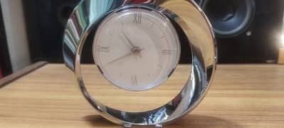 Unique clock finished metal design