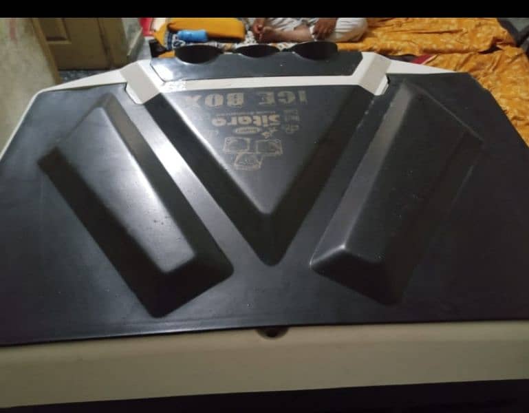 Full size cooler in use with ice boxes 4