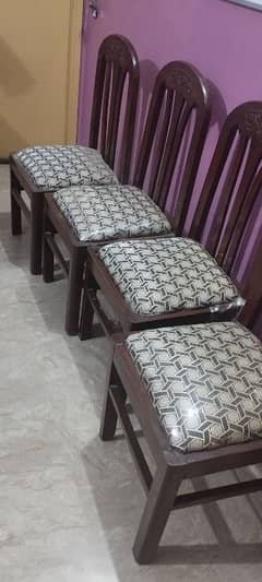 Four wooden chairs only