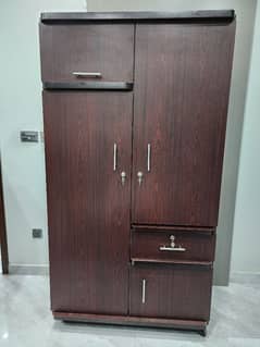 Solid Wooden Wardrobe with Locks & Drawers – Good Condition