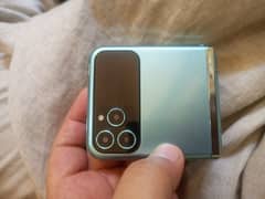 QMobile Flip keypad mobile ha 4SIM