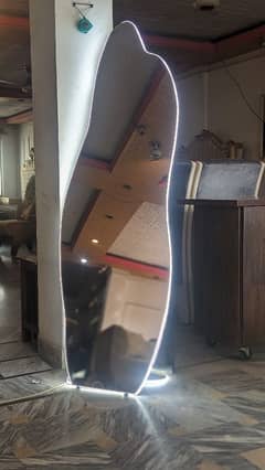 standing looking mirror