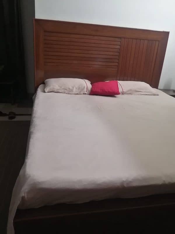 king size double bed with 2 side tables. 0