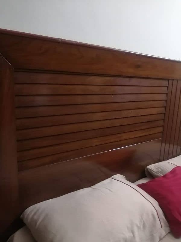 king size double bed with 2 side tables. 1