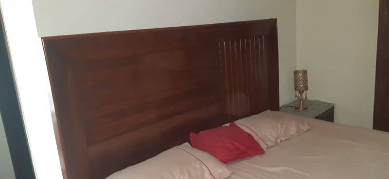 king size double bed with 2 side tables. 3