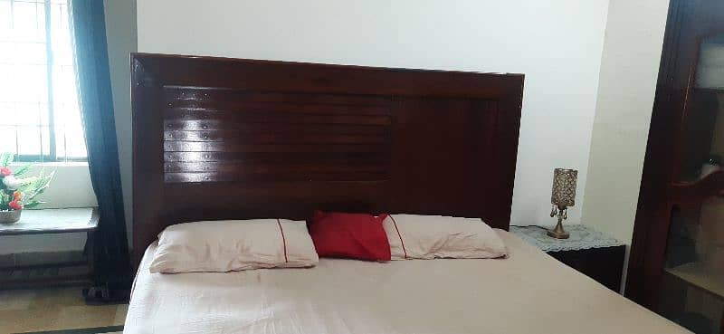 king size double bed with 2 side tables. 4