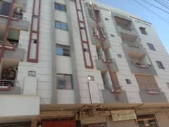 NEWLY FLAT 2 BAD DD 3RD FLOOR ROAD FACING ON MAIN RASHID MINHAS ROAD