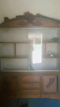 I am a house wife l am sell the showcase and dressing making in pure w