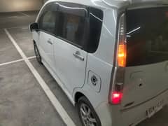 Daihatsu Move 2015 pearl white color better than Mira Passo