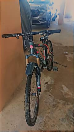 sports cycle with helmet