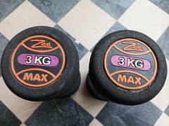 A pair of 3 kg dumbells. original zeemax