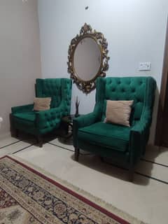 Green sofas chairs