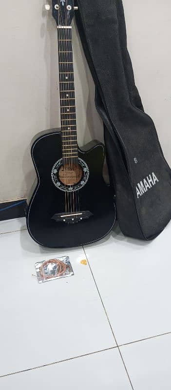 black guitar only 2 month use with bag and extra strings 1