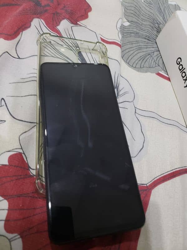 hi I am selling my Samsung a12 4/128 gb 4