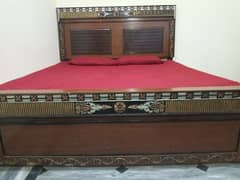 King size wooden bed