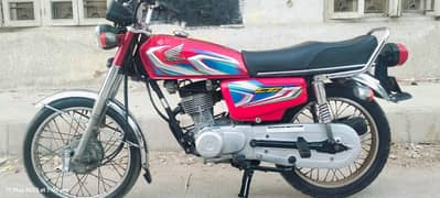 Honda 125 2022 totally nut to nut genuine condition Karachi number ok