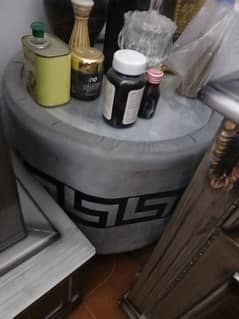 2 chairs with a small round table in good condition