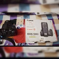 Canon 1300d wifi dslr with 18-55mm lens Full box and all accessories.