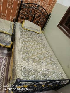 Two Iron single Beds