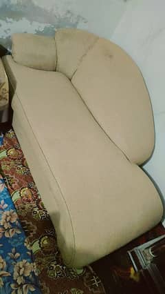 corner sofa and 2 wood  chairs with chair forms