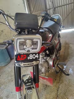 Honda 70 new Number AZP 8804