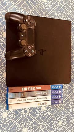 Ps4 for sale, with controller, dual controller charger, 4 games