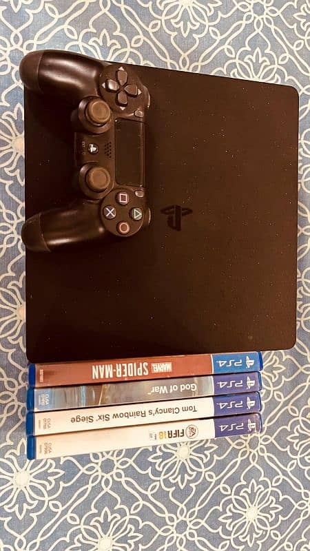 Ps4 for sale, with controller, dual controller charger, 4 games 0