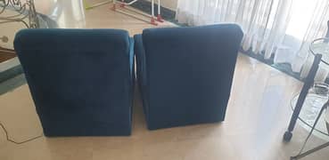 2 single seater sofas