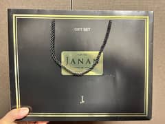 J.