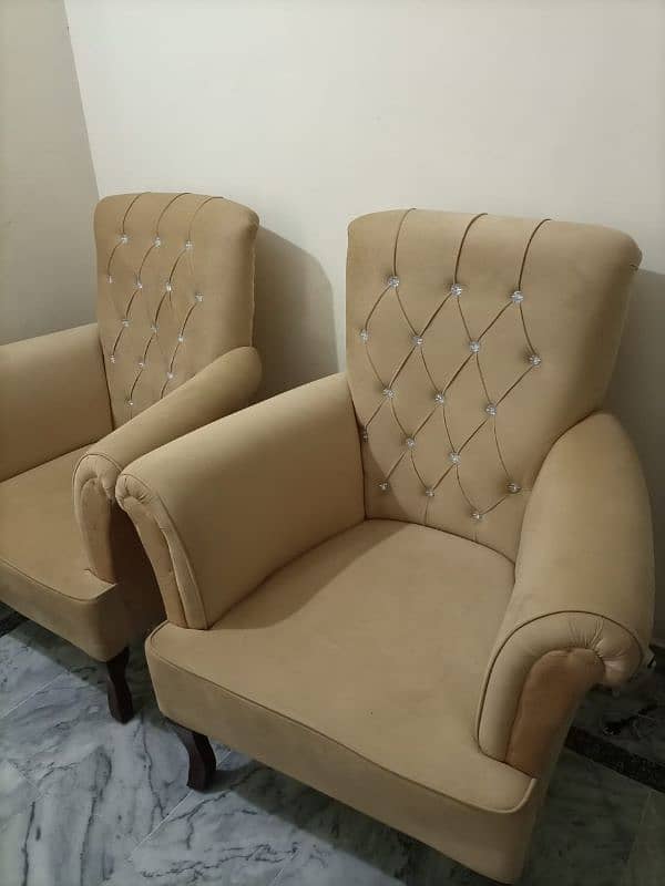 Elegant pair of single sofa and table 0