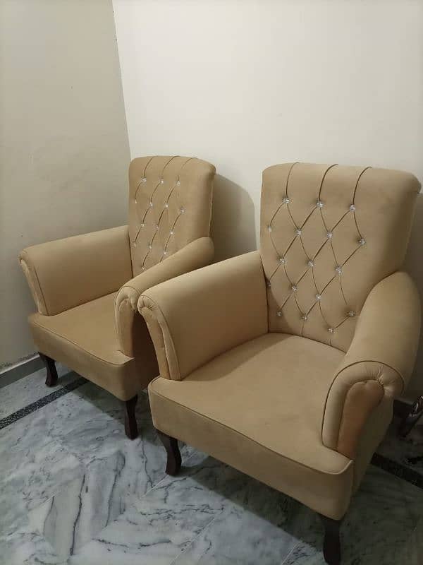 Elegant pair of single sofa and table 1