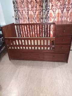 Wooden baby crib