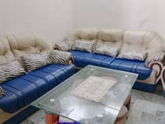 7 seater sofa set with center glass table