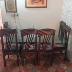 Good Condition 6 chair and one table.