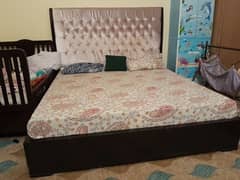 king size bed along with 2 side table