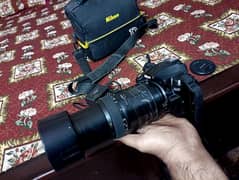 Nikon D5000 dslr camera big lens 70-300mm great result video canon