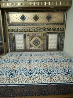 bed with side tables and dressing