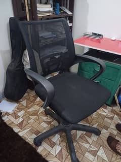 Black revolving office chair.
