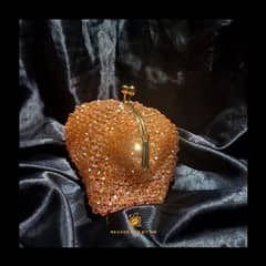 Crystal hand clutch