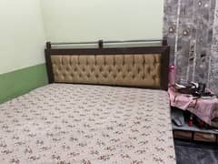 King Size bed with two sides tables